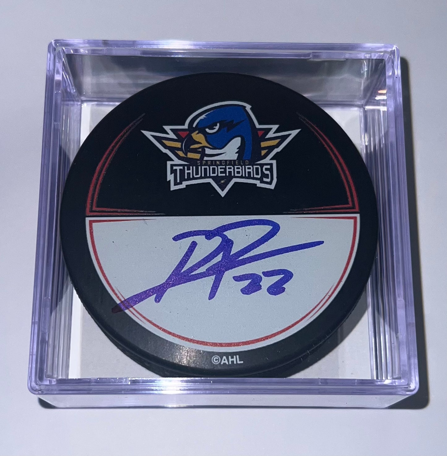 Signed Puck in Cube - #22 Dylan Peterson