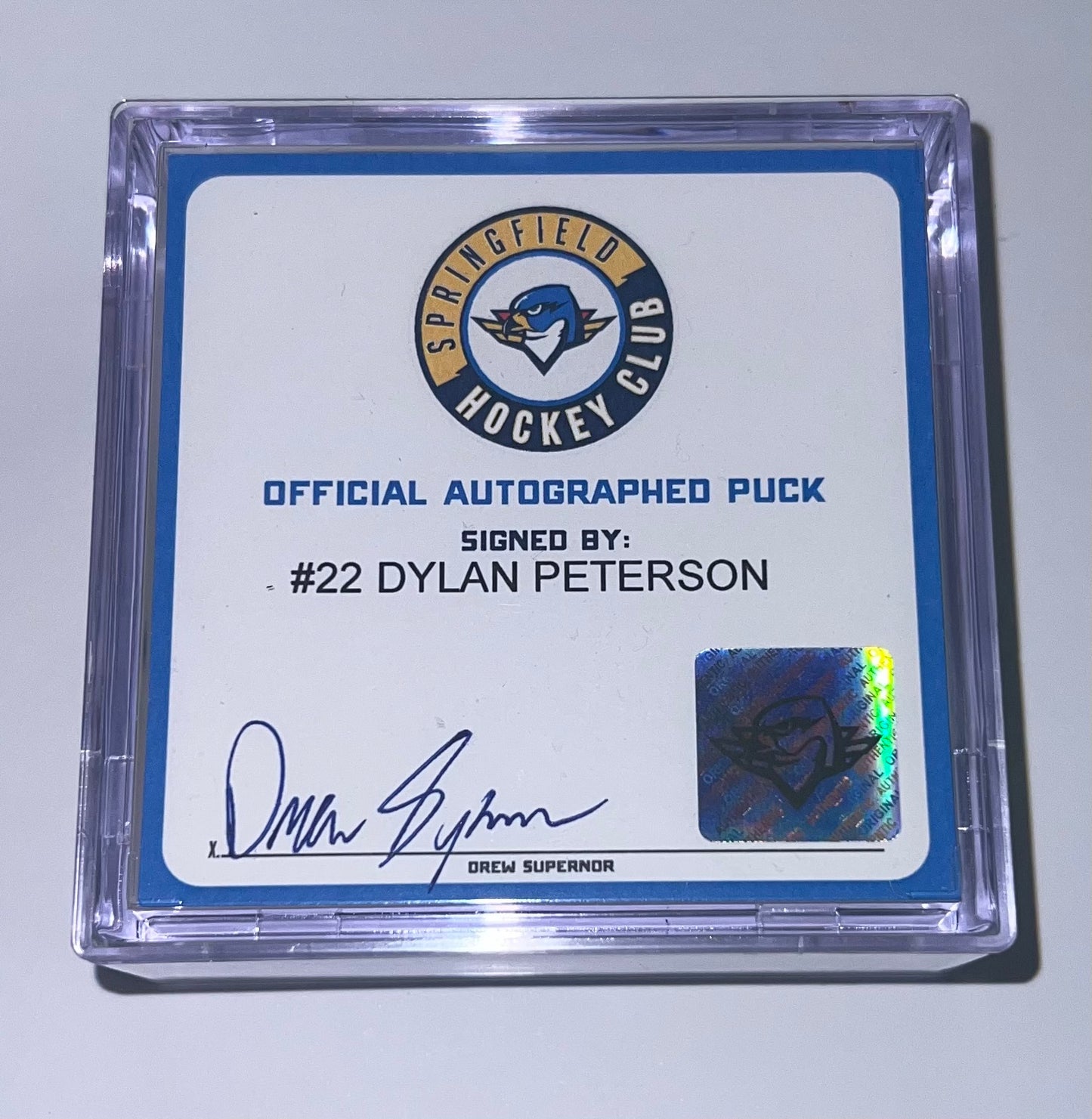 Signed Puck in Cube - #22 Dylan Peterson