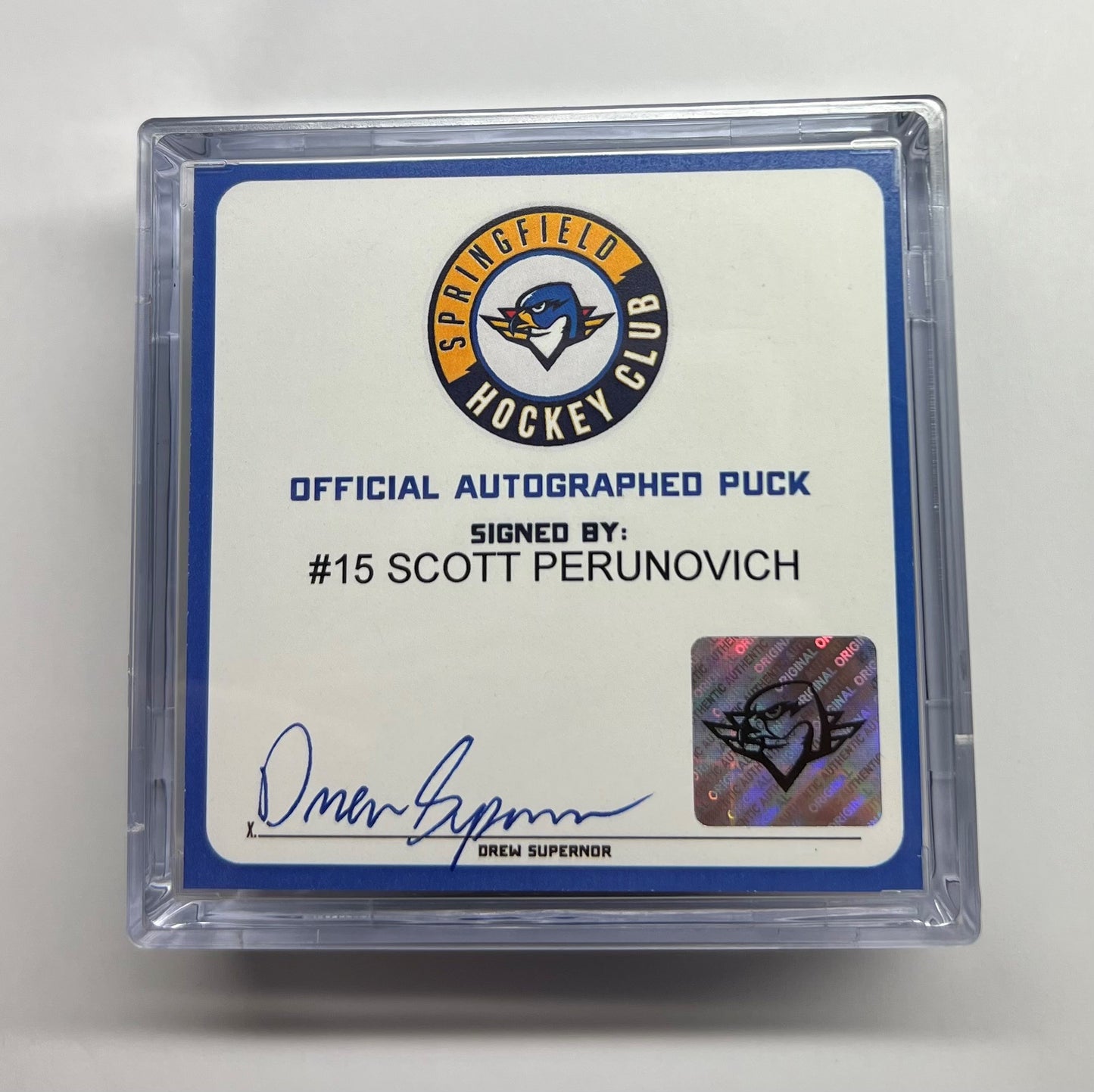 Signed Puck in Cube - #15 Scott Perunovich