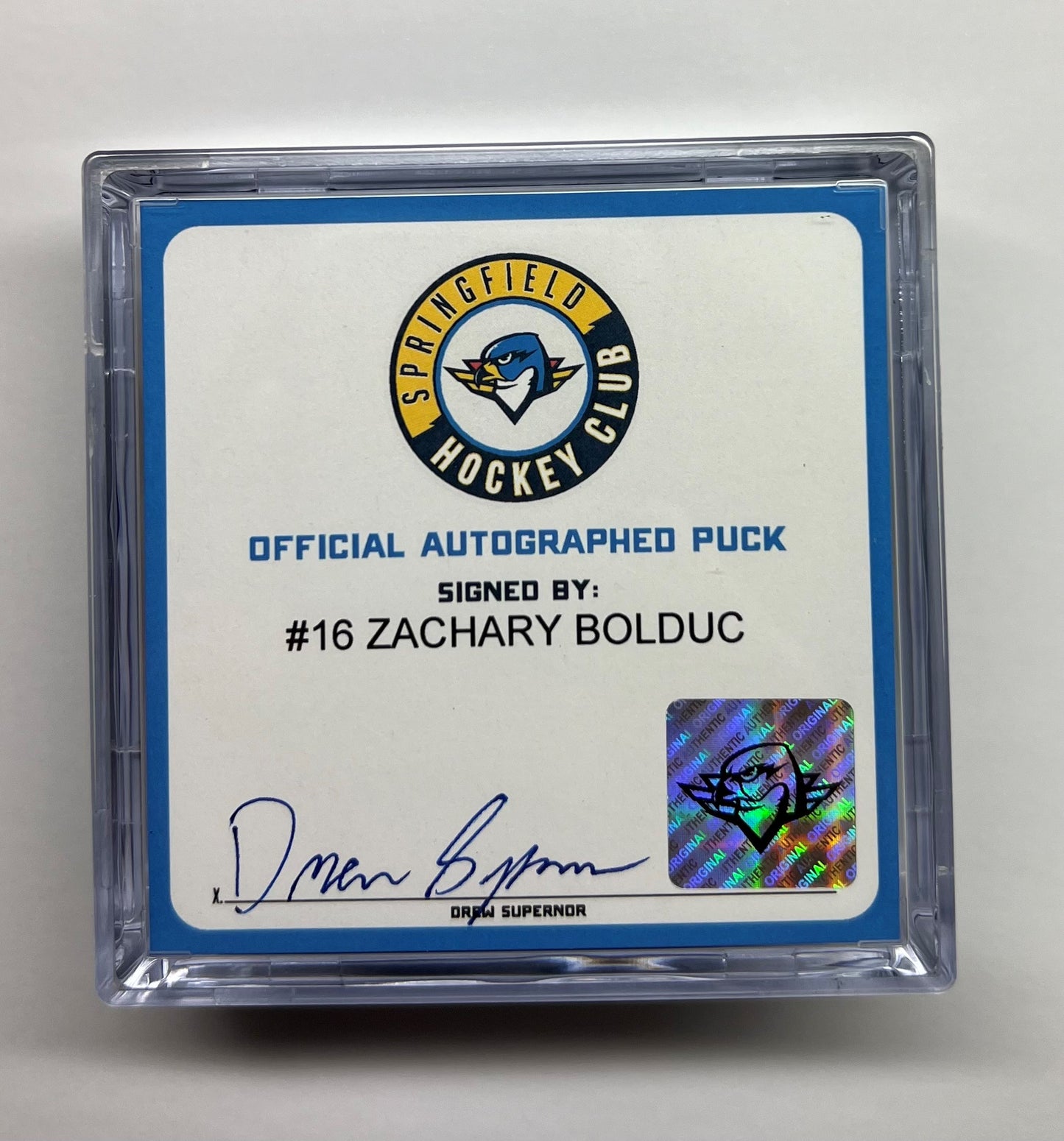 Signed Puck in Cube - #16 Zachary Bolduc