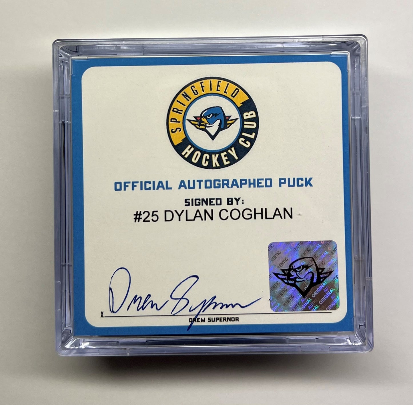 Signed Puck in Cube - #25 Dylan Coghlan